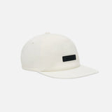 ESSENTIALS BASEBALL HAT - CLOUD DANCER