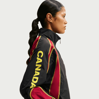 CANADA X NOCTA X NIKE "X2" NORTHSTAR NYLON TRACK JACKET - BLACK / GYM RED