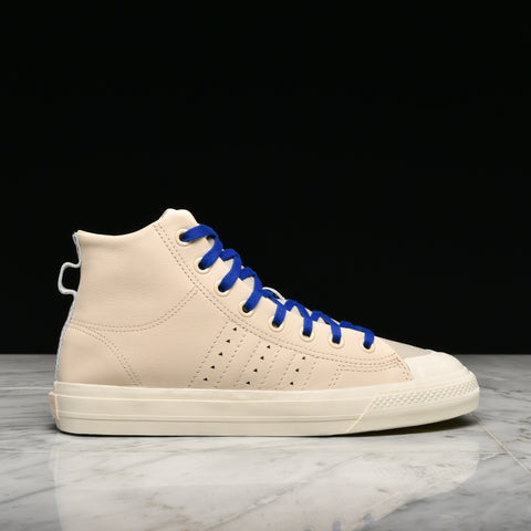 PHARRELL WILLIAMS X ADIDAS NIZZA HI RF - ECRU TINT / CREAM WHITE / CLEAR BROWN