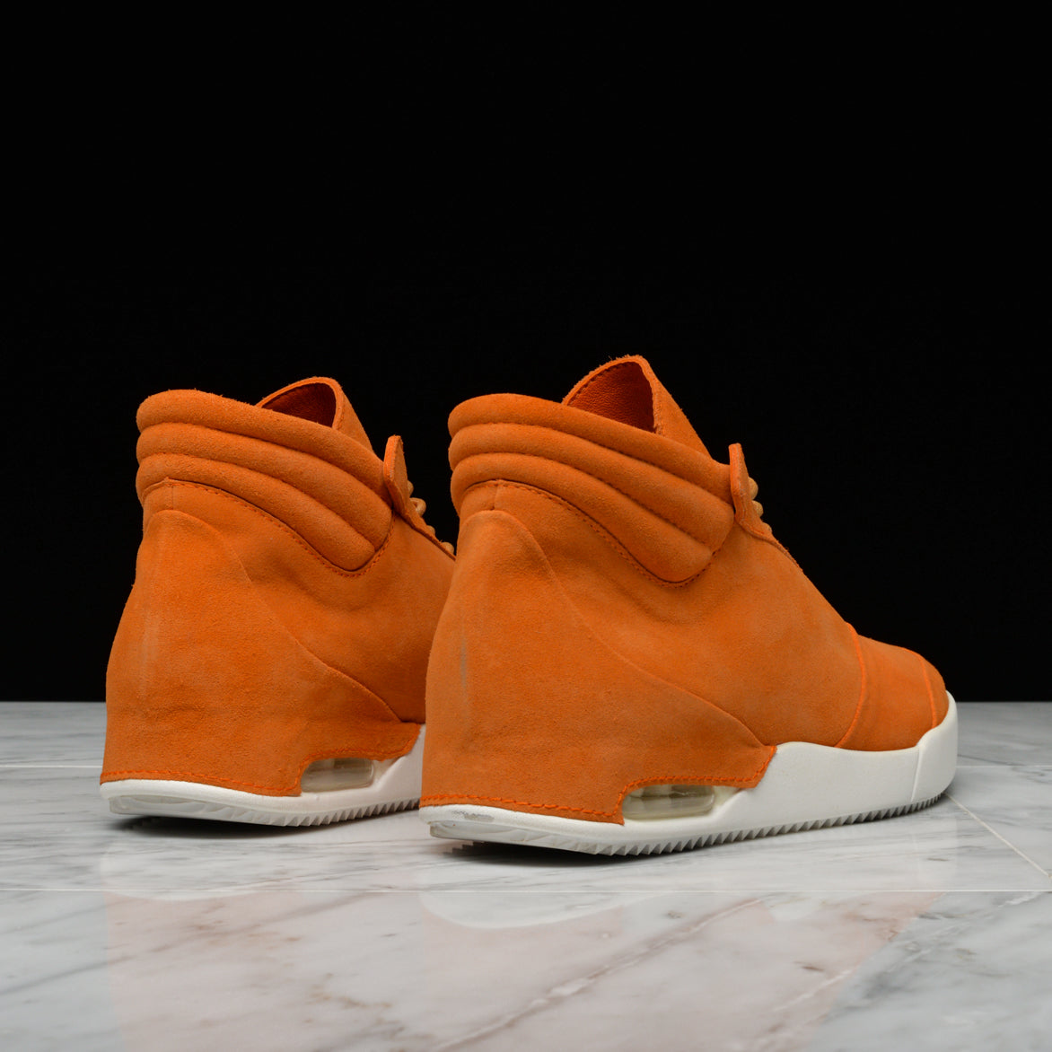 001 BY JOHN GEIGER - CLAW/BURNT ORANGE