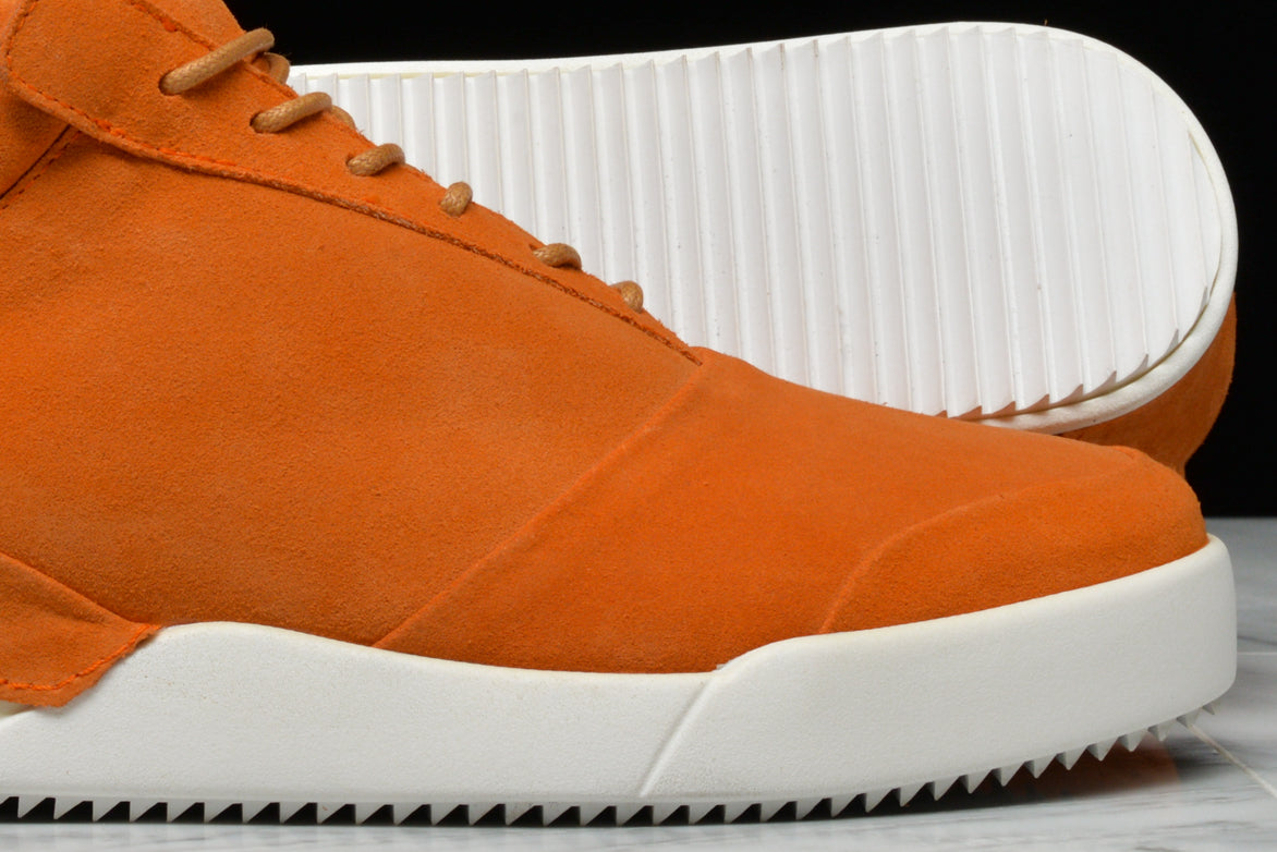 001 BY JOHN GEIGER - CLAW/BURNT ORANGE